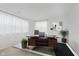 Bright office featuring a wooden desk, sheer curtains, and potted plants at 12990 Moultrie St, Carmel, IN 46032