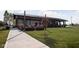 Picturesque community building featuring outdoor seating, modern design and a well-manicured lawn at 1415 Beaumont Cir, Westfield, IN 46074