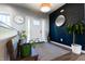 Inviting entryway with stylish decor, featuring wood floors and contemporary accents at 1472 Maple Ridge Ct, Columbus, IN 47201