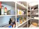 Walk-in pantry with organized shelves and plenty of storage at 1472 Maple Ridge Ct, Columbus, IN 47201