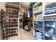 Well-organized walk-in closet with shelves and rods for shoes, clothes, and accessories at 1472 Maple Ridge Ct, Columbus, IN 47201