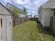 Exterior view of a fenced backyard at 152 1St W St, Shelbyville, IN 46176