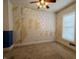 Empty bedroom with peeling wallpaper, ceiling fan and closed blinds at 152 1St W St, Shelbyville, IN 46176