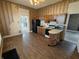 Spacious kitchen with wood cabinets, modern appliances, and hardwood floors at 152 1St W St, Shelbyville, IN 46176