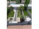Aerial view of the backyard with multiple patio areas, green grass, and landscaping at 1520 Central Ave, Indianapolis, IN 46202