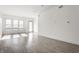 Open floor plan living room featuring bright natural light and a sliding glass door for easy outdoor access at 1520 Central Ave, Indianapolis, IN 46202