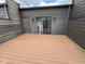 Relaxing roof deck features wood flooring, natural light, and a sliding glass door at 1520 Central Ave, Indianapolis, IN 46202