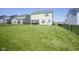 Large, well-manicured backyard with fresh cut grass at 15413 Staffordshire Way, Fishers, IN 46037