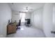Office bedroom with carpet, a ceiling fan, and a window providing ample natural light at 15413 Staffordshire Way, Fishers, IN 46037