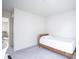 This bedroom includes carpet and a twin bed with natural light streaming in from a window at 15413 Staffordshire Way, Fishers, IN 46037