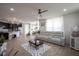 Spacious living room seamlessly connects with the kitchen, creating an open and inviting atmosphere at 15413 Staffordshire Way, Fishers, IN 46037