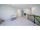 Spacious upstairs loft area featuring plush carpeting, light walls and plant at 15413 Staffordshire Way, Fishers, IN 46037