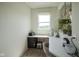 Bright office nook with natural light, counter space and built-in storage at 15413 Staffordshire Way, Fishers, IN 46037