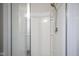 Shower featuring glass door, tile surround, and a shower head at 15413 Staffordshire Way, Fishers, IN 46037