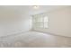 Bedroom featuring a light, airy feel with carpet and a window at 16001 Concert Way, Noblesville, IN 46060