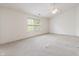 Bright bedroom features vaulted ceilings, neutral walls, and large windows at 16001 Concert Way, Noblesville, IN 46060
