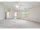 Bright main bedroom with carpet flooring and multiple windows offering natural light and attached bathroom at 16001 Concert Way, Noblesville, IN 46060