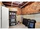 Basement storage with shelving, organizing bins, and insulated walls at 16516 Wilsons Farm Dr, Fishers, IN 46040