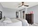 Bright bedroom with light blue walls and an attached bathroom at 16516 Wilsons Farm Dr, Fishers, IN 46040