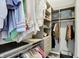 The walk-in closet has custom shelving, drawers, and ample storage at 16516 Wilsons Farm Dr, Fishers, IN 46040