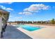 Inviting community pool with ample deck space and views of the surrounding neighborhood at 16516 Wilsons Farm Dr, Fishers, IN 46040