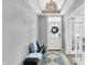 Inviting entryway featuring stylish decor, a cozy bench with accent pillows, and a decorative rug, setting a welcoming tone at 16516 Wilsons Farm Dr, Fishers, IN 46040