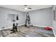 This exercise room includes exercise equipment, a punching bag, and mirrors for a complete workout space at 16516 Wilsons Farm Dr, Fishers, IN 46040