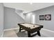 Game room features an air hockey table and contemporary decor at 16516 Wilsons Farm Dr, Fishers, IN 46040