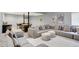 Comfortable living room features sectional sofa, ottomans, and cozy decor at 16516 Wilsons Farm Dr, Fishers, IN 46040