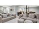 Open recreation room with ample seating, games and wet bar for entertaining at 16516 Wilsons Farm Dr, Fishers, IN 46040