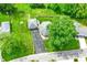 Overhead view of a charming property with a well-maintained lawn and a lengthy driveway at 169 Bayview Dr, Cicero, IN 46034