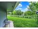 Serene backyard featuring a well-maintained lawn and shade, creating a tranquil outdoor space at 169 Bayview Dr, Cicero, IN 46034