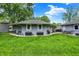 Well-maintained backyard with lush green grass and patio area, perfect for outdoor entertaining at 169 Bayview Dr, Cicero, IN 46034