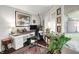Bright home office with natural light, hardwood floors, and ample desk space for productivity at 169 Bayview Dr, Cicero, IN 46034
