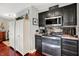 Updated kitchen showcasing sleek appliances and ample counter space for meal preparation at 169 Bayview Dr, Cicero, IN 46034