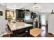Stylish kitchen with modern stainless-steel appliances and a large island with seating at 169 Bayview Dr, Cicero, IN 46034