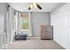 Bedroom features neutral colors, ceiling fan, large window with lots of natural light at 1815 Kingen Dr, Greenfield, IN 46140