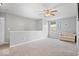Cozy sitting area with neutral walls, a large window, and comfortable seating under a ceiling fan at 1815 Kingen Dr, Greenfield, IN 46140