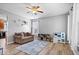 Spacious living room featuring natural light, a soft rug, and room for activities at 1815 Kingen Dr, Greenfield, IN 46140