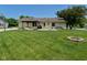 The backyard features a well-manicured lawn, a patio, and a gazebo at 199 Three Notch Ln, Bargersville, IN 46106