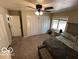 Spacious bedroom featuring a ceiling fan, closet and large bed at 209 Brighton Ct, Greenwood, IN 46143