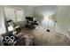 Cozy bedroom with a rocking chair, large window, and desk creating an ideal workspace at 209 Brighton Ct, Greenwood, IN 46143
