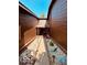 Charming courtyard entry with decorative pebbles, potted plants, and whimsical decor, adding unique curb appeal at 209 Brighton Ct, Greenwood, IN 46143
