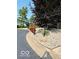 Charming home with a mailbox, mature trees, landscaping, and signage at 209 Brighton Ct, Greenwood, IN 46143