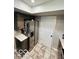 Kitchen featuring stainless steel refrigerator and tile flooring at 209 Brighton Ct, Greenwood, IN 46143