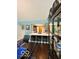 View of kitchen from dining area, featuring barstool seating and modern appliances at 209 Brighton Ct, Greenwood, IN 46143