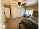 Spacious bedroom features neutral carpeting, ceiling fan, and large closet for ample storage at 209 Brighton Ct, Greenwood, IN 46143