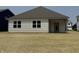 House with a backyard and lush lawn, perfect for outdoor activities and relaxation at 2143 Warbler St, Danville, IN 46122