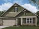 Charming single-Gathering home with a neutral color palette, complemented by a 2-car garage and covered porch at 2143 Warbler St, Danville, IN 46122