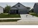 Charming single-Gathering home with a manicured lawn and attached two car garage at 2143 Warbler St, Danville, IN 46122